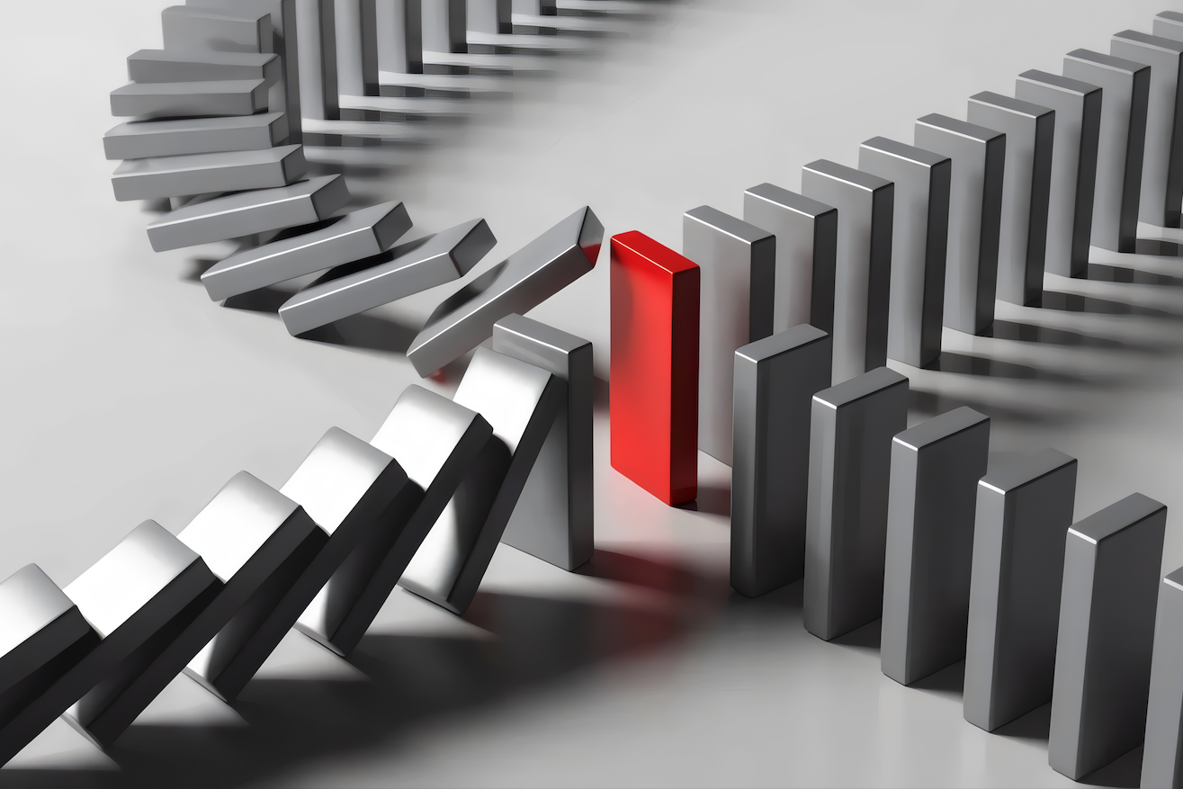 Illustration représentant un domino rouge interrompant une réaction en chaîne de dominos gris, symbole d'un déclencheur pouvant réactiver le système nerveux.